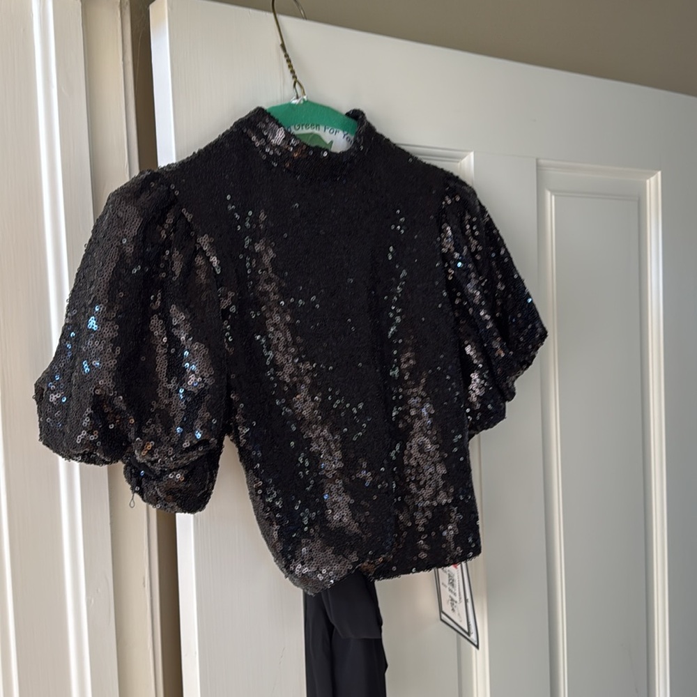 Sequin top! Goes over  sleek black dress or tank top. Brand new.